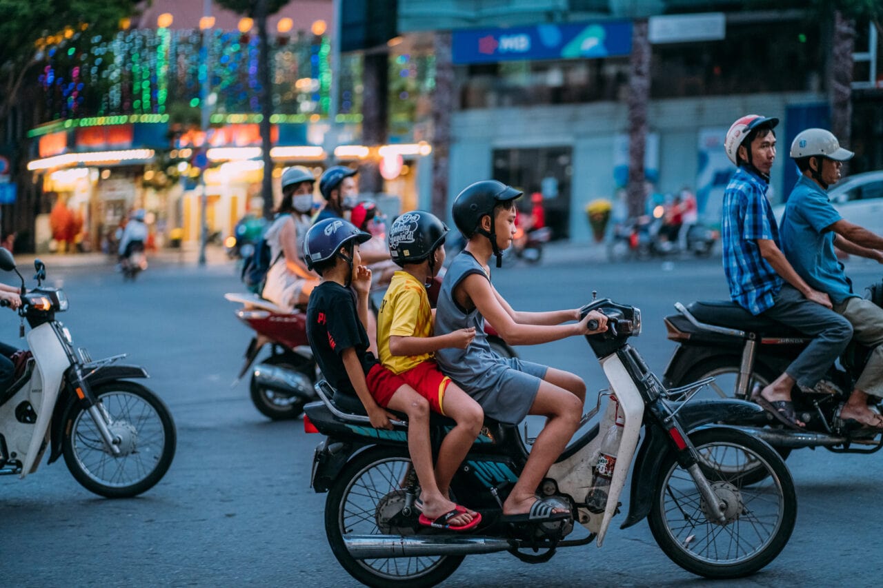 Kids riding a scooter